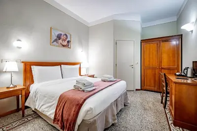 Letto o letti in una camera di Bellevue House Affittacamere