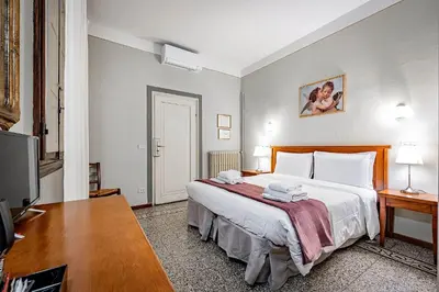 Letto o letti in una camera di Bellevue House Affittacamere