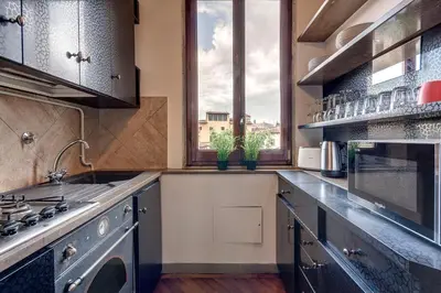 Cucina o angolo cottura di Spirito19 Apartment by Mamo Florence