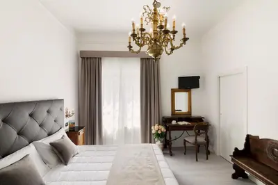 Letto o letti in una camera di Hotel Berna