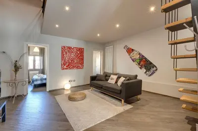 Area soggiorno di Zita Apartment by Mamo Florence