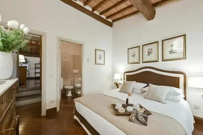 Letto o letti in una camera di Buonarroti big apartment with terrace in Oltrarno