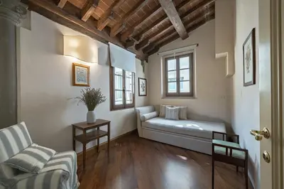 Letto o letti in una camera di Tiziano big penthouse in the Oltrarno