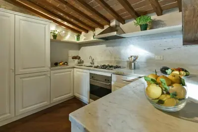 Cucina o angolo cottura di Tiepolo romantic penthouse in the Oltrarno