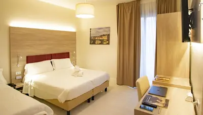 Letto o letti in una camera di Hotel Perlage Florence - Free city tax until 31st may -with Private Parking & Fast Wifi