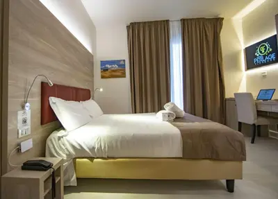 Letto o letti in una camera di Hotel Perlage Florence - Free city tax until 31st may -with Private Parking & Fast Wifi