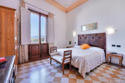 Letto o letti in una camera di Soggiorno Isabella De' Medici