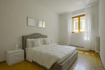 Letto o letti in una camera di Domus Palanti