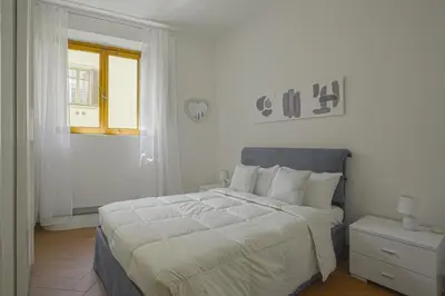 Letto o letti in una camera di Domus Palanti