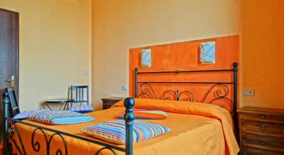Letto o letti in una camera di Affittacamere Belfiore