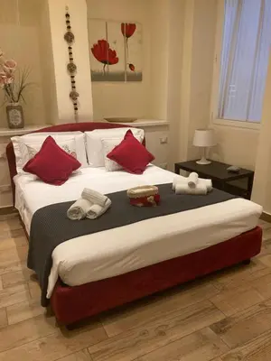 Letto o letti in una camera di Borgo20 Firenze