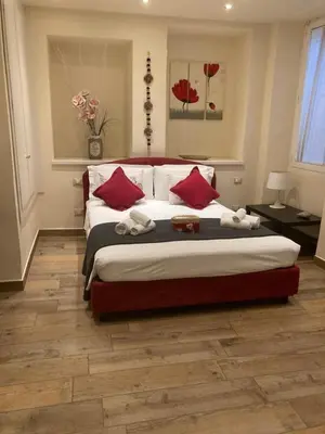 Letto o letti in una camera di Borgo20 Firenze