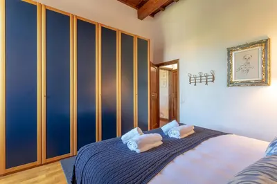Letto o letti in una camera di Discovering Florence