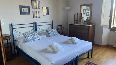 Letto o letti in una camera di Discovering Florence