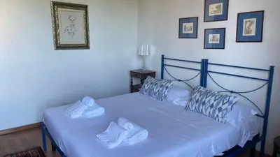 Letto o letti in una camera di Discovering Florence