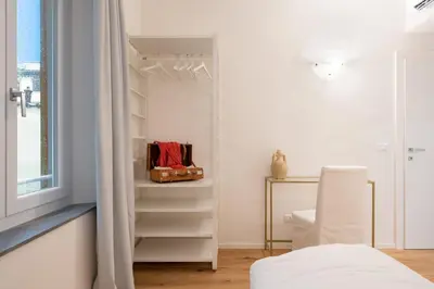 Letto o letti in una camera di Accademia - Flo Apartments