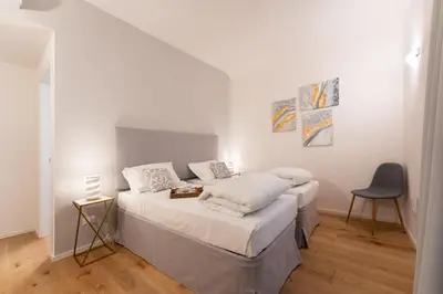 Letto o letti in una camera di Accademia - Flo Apartments