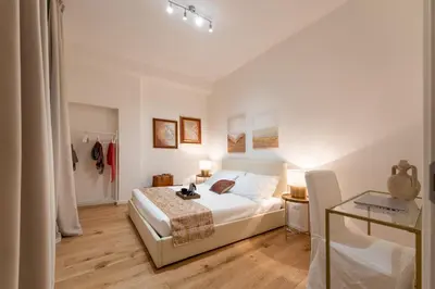 Letto o letti in una camera di Accademia - Flo Apartments