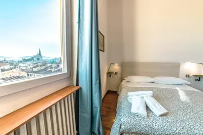 Letto o letti in una camera di Casa Pavó Appartamento accanto al Bargello
