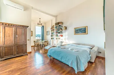 Letto o letti in una camera di Casa Pavó Appartamento accanto al Bargello