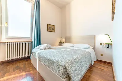 Letto o letti in una camera di Casa Pavó Appartamento accanto al Bargello