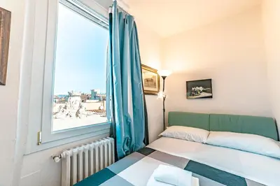 Letto o letti in una camera di Casa Pavó Appartamento accanto al Bargello