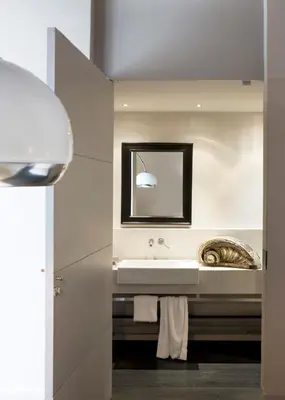 Letto o letti in una camera di Riva Lofts Florence