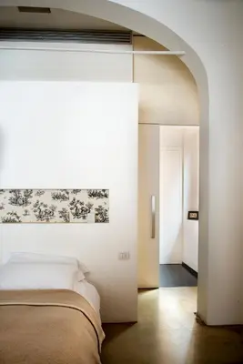 Letto o letti in una camera di Riva Lofts Florence