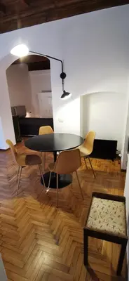 Area soggiorno di Enchanting Apartment with Patio, Lungarno Firenze