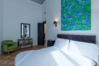 Letto o letti in una camera di Cavour 83 Prestige House by 360Rentals