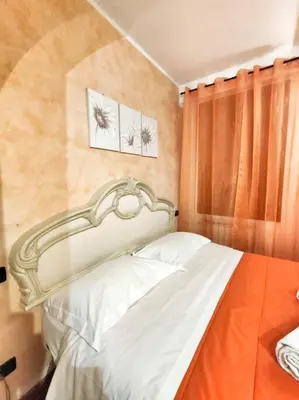 Letto o letti in una camera di Appartamento Stella in centro a Firenze