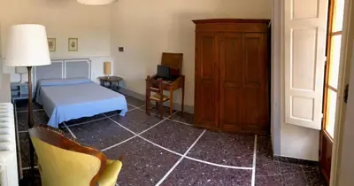 Letto o letti in una camera di Il Salotto di Berentano