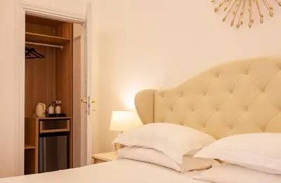 Letto o letti in una camera di Villa Royal B&B
