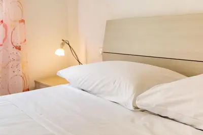 Letto o letti in una camera di GuestHost - Florence Quiet and Bright Apartment