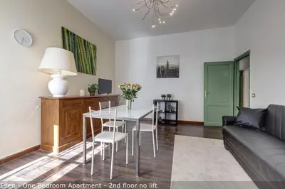 Area soggiorno di Alice & Ellen Apartments by Mamo Florence
