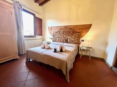 Letto o letti in una camera di Typical apartment in the historic centre