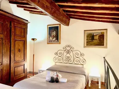 Letto o letti in una camera di Typical apartment in the historic centre