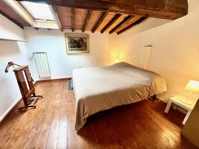Letto o letti in una camera di Typical apartment in the historic centre