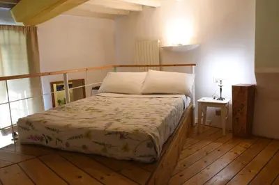 Letto o letti in una camera di Casa Gori