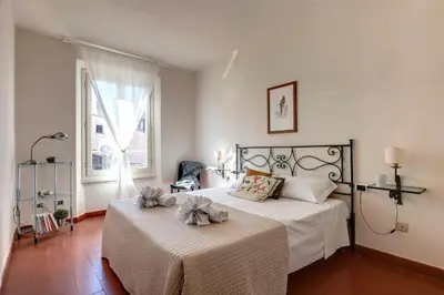 Letto o letti in una camera di Guendalina Apartment by Mamo Florence