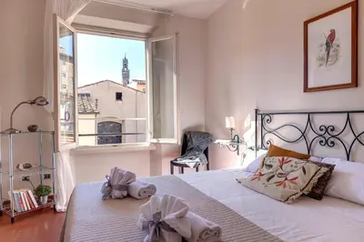 Letto o letti in una camera di Guendalina Apartment by Mamo Florence