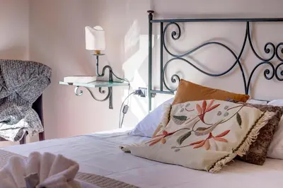 Letto o letti in una camera di Guendalina Apartment by Mamo Florence