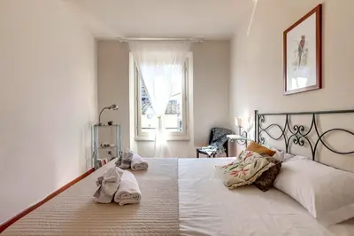 Letto o letti in una camera di Guendalina Apartment by Mamo Florence
