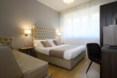 Letto o letti in una camera di Domus Uffizi