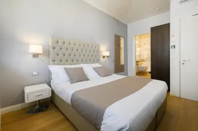Letto o letti in una camera di Domus Uffizi