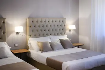 Letto o letti in una camera di Domus Uffizi