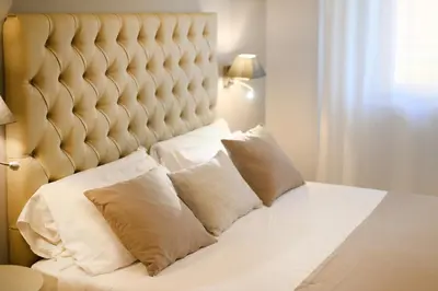 Letto o letti in una camera di Domus Uffizi