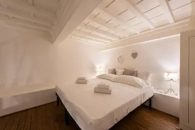 Letto o letti in una camera di Toscanella Romantic by Mmega
