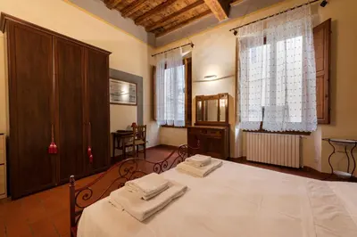 Letto o letti in una camera di Giglio Classic by Mmega