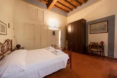 Letto o letti in una camera di Giglio Classic by Mmega